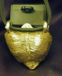 Tibetan Terrier Clicker Pendant, top view