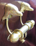 Dolphin Duet Door Knocker, side view